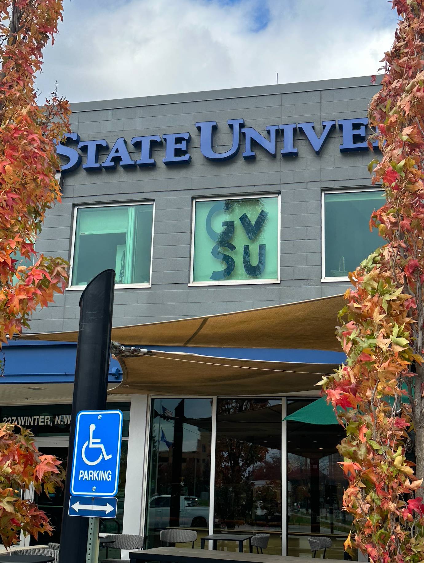 PCE Homecoming decorations, "GVSU" painted on a window at IDC